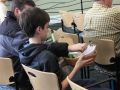 Passing out the Guest at Your Table boxes.