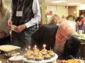 Don blowing out the candles.