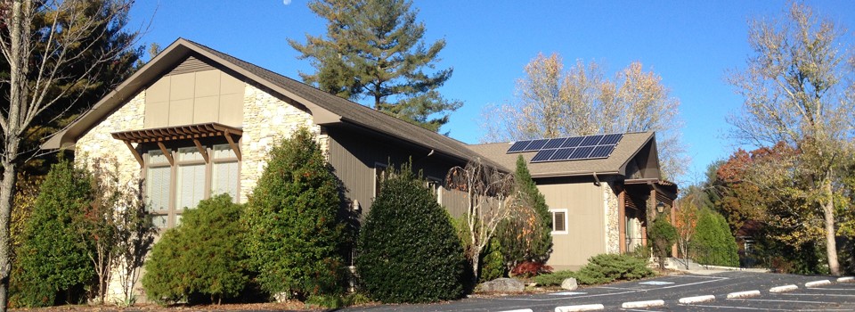building with new solar panels
